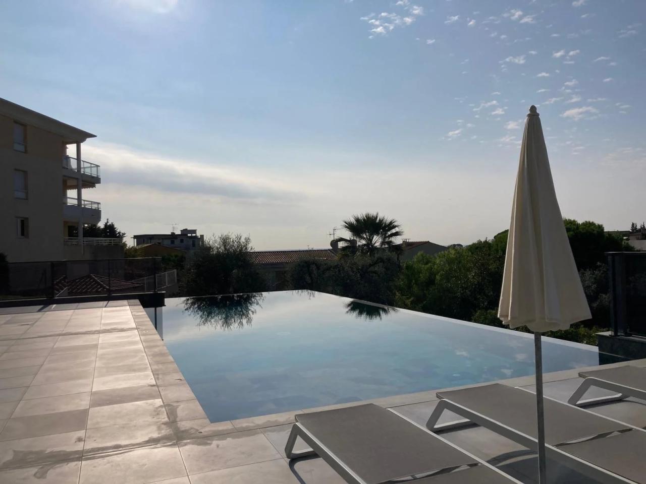 Cannes Petit Juas – 2 pièces neuf au dernier étage avec terrasse, piscine et garage – 7